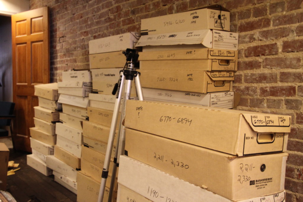 Boxes of photos in the WSGS studio space