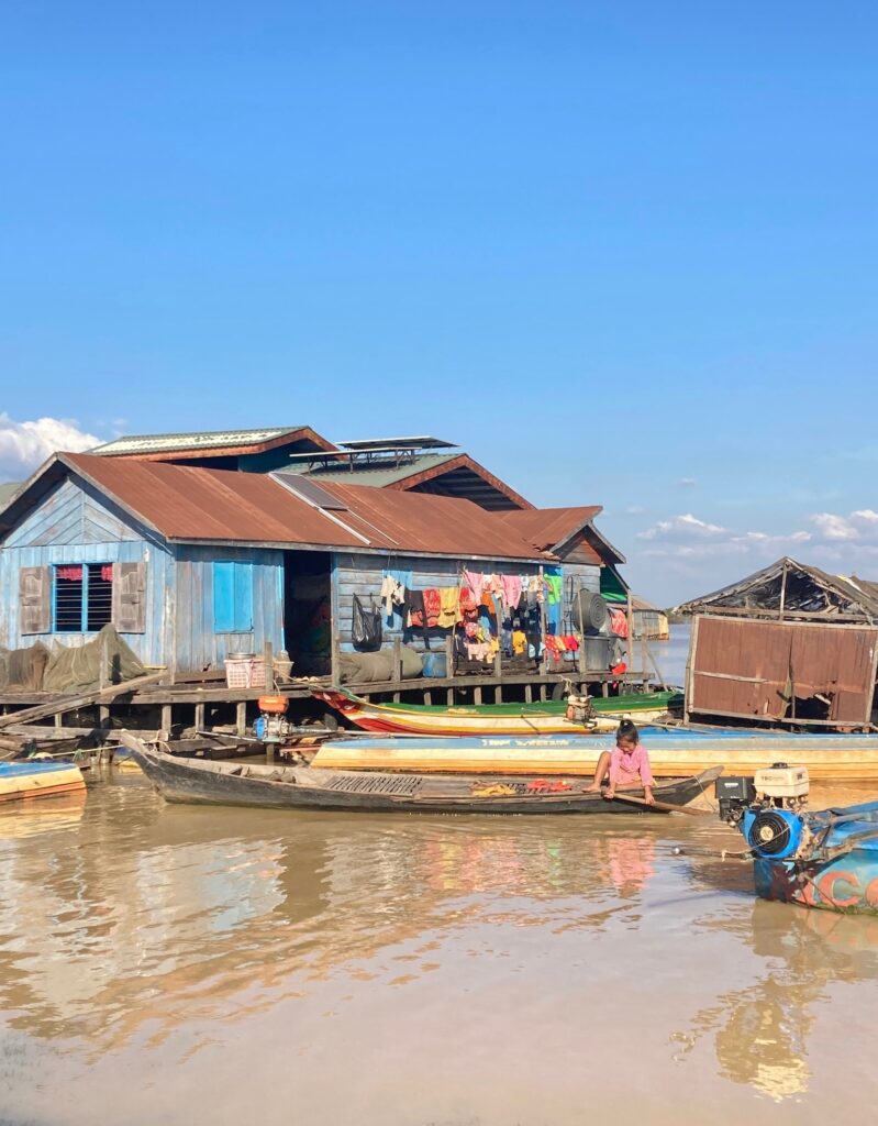 1st Place: Muddy Sky - Chong Khneas Floating Village, Tonle Sap Lake, Cambodia - Star Neorr